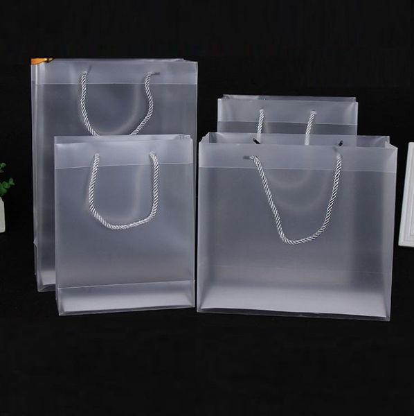 gift wrap 100pcs multi sizes pp plastic handbag frosted transparent packaging bags with handle clear party favors bag wen6160
gift wrap 100pcs multi sizes pp plastic handbag frosted transparent packaging bags with handle clear party favors bag wen6160