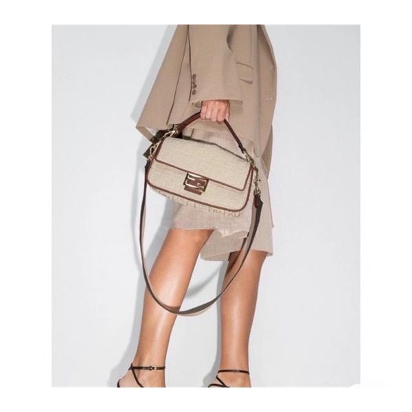 new baguette double ff3d embroidered canvas baton single shoulder cross carrying portable leisure bag in spring and summer of 2021
new baguette double ff3d embroidered canvas baton single shoulder cross carrying portable leisure bag in spring and summer of 2021