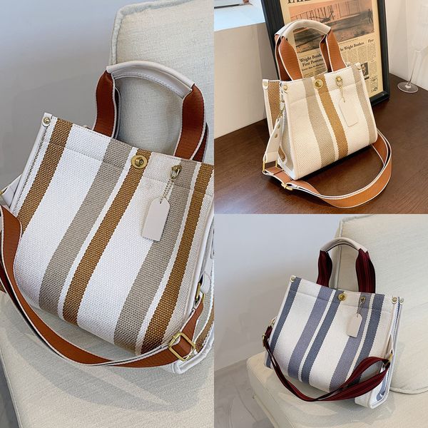 large capacity bag women's versatile new fashion canvas one shoulder messenger bag portable tote handbags
large capacity bag women's versatile new fashion canvas one shoulder messenger bag portable tote handbags