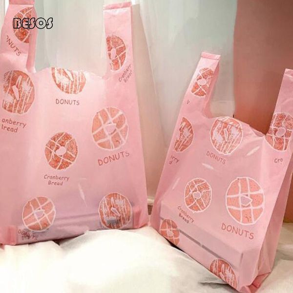 100pcs wholesale dreamly pink doughnut large plastic tote bag baked dessert gift packaging cake egg tart wrap
100pcs wholesale dreamly pink doughnut large plastic tote bag baked dessert gift packaging cake egg tart wrap