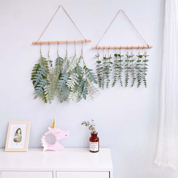 tapestries nordic style wall decoration fashionable wooden stick craft green and orange plastic leaves imitation plant decorations 
tapestries nordic style wall decoration fashionable wooden stick craft green and orange plastic leaves imitation plant decorations