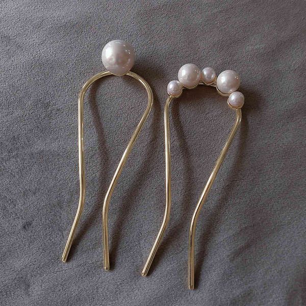 factory wholesale u-shaped color preserving electroplating pearl dish ball head female simple temperament insert pin fork shape hair hea/rts
factory wholesale u-shaped color preserving electroplating pearl dish ball head female simple temperament insert pin fork shape hair hea/rts