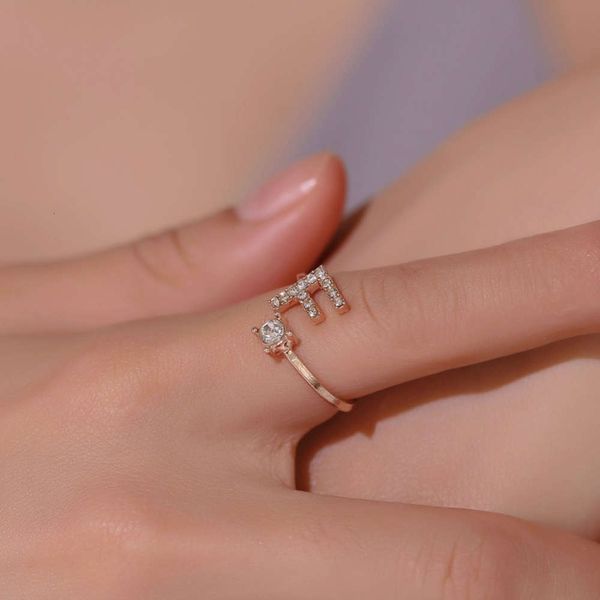 selling hand ornament simple and versatile creative diamond 26 english letter adjustable ring, Black
selling hand ornament simple and versatile creative diamond 26 english letter adjustable ring, Black