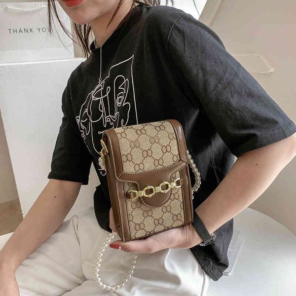 2022 factory wholesale handbag vertical mobile phone bag spring and summer pearl chain women's bag
2022 factory wholesale handbag vertical mobile phone bag spring and summer pearl chain women's bag