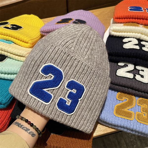 autumn and winter candy colored wool hat men and women's personality pasted cloth thickened warm knitted cold hat tide, Blue;gray 
autumn and winter candy colored wool hat men and women's personality pasted cloth thickened warm knitted cold hat tide, Blue;gray