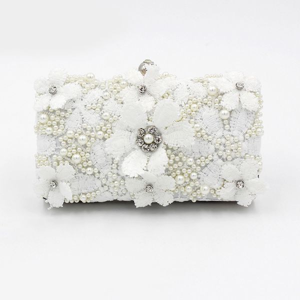 evening bag dinner hand sewn with lace and pearl
evening bag dinner hand sewn with lace and pearl