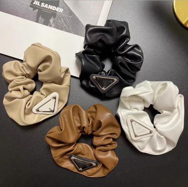 european american big brand leather letter ring iron triangle pu hair accessories and fast delivery, Pink
european american big brand leather letter ring iron triangle pu hair accessories and fast delivery, Pink