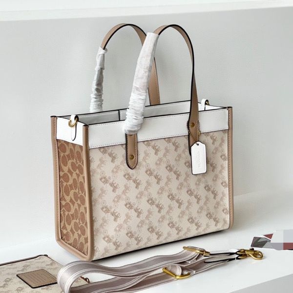 outlet carriage 2021 classic fashion design portable messenger printed letter shopping bag luxuryss yw
outlet carriage 2021 classic fashion design portable messenger printed letter shopping bag luxuryss yw