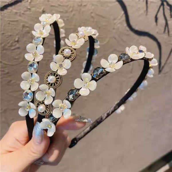 fashion hoop pearl rhinestone flower headdress temperament design sense, Black;brown
fashion hoop pearl rhinestone flower headdress temperament design sense, Black;brown
