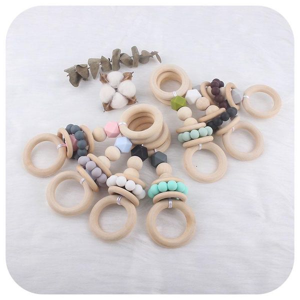 baby teethers toys silicon and wooden ring eco-fridendly material 2021 original design infant education accessories gift present
baby teethers toys silicon and wooden ring eco-fridendly material 2021 original design infant education accessories gift present