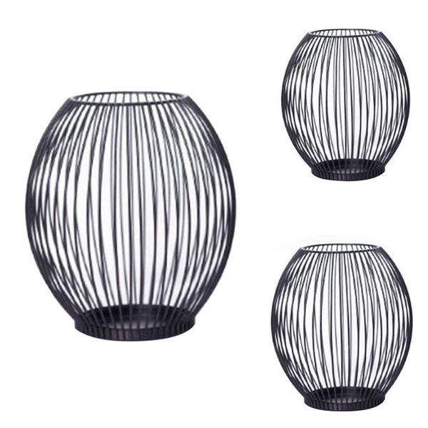 candle holders metal lantern tea light votive flame home el decoration ornaments design candlestick decor 
candle holders metal lantern tea light votive flame home el decoration ornaments design candlestick decor
