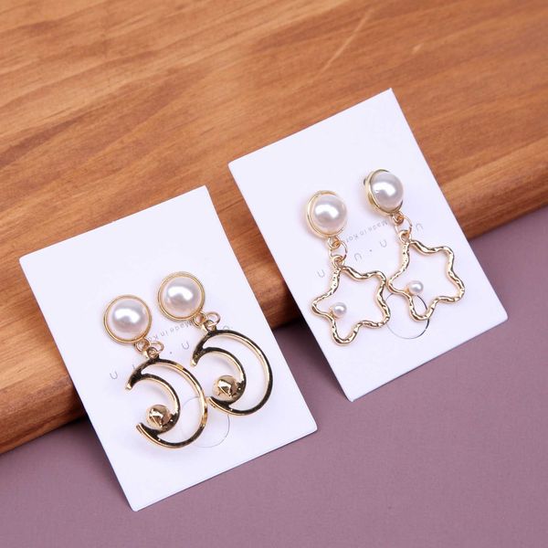 70%off pearl temperament fashion design sense star moon female earrings, Golden
70%off pearl temperament fashion design sense star moon female earrings, Golden