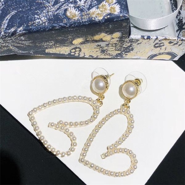 new love pearl female peach heart earrings s925 silver needle precision jewelry, Black
new love pearl female peach heart earrings s925 silver needle precision jewelry, Black