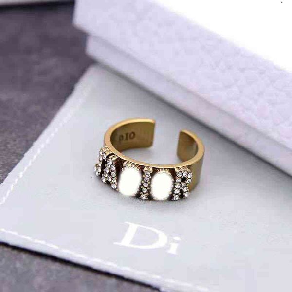 with letter dio/christian old brass d inlaid / diamond dijia and open net red ring, Red;brown
with letter dio/christian old brass d inlaid / diamond dijia and open net red ring, Red;brown