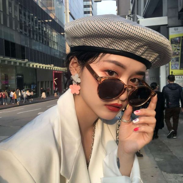 women's small sunglasses frame oval, White;black
women's small sunglasses frame oval, White;black