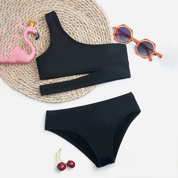 one children's bikini shoulder solid color small and medium sized girls' split swimsuit, White;black 
one children's bikini shoulder solid color small and medium sized girls' split swimsuit, White;black
