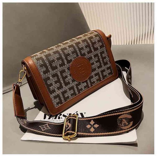 2022 latest handbag factory store on women's small square simple letter korean messenger trend bags, Black;red