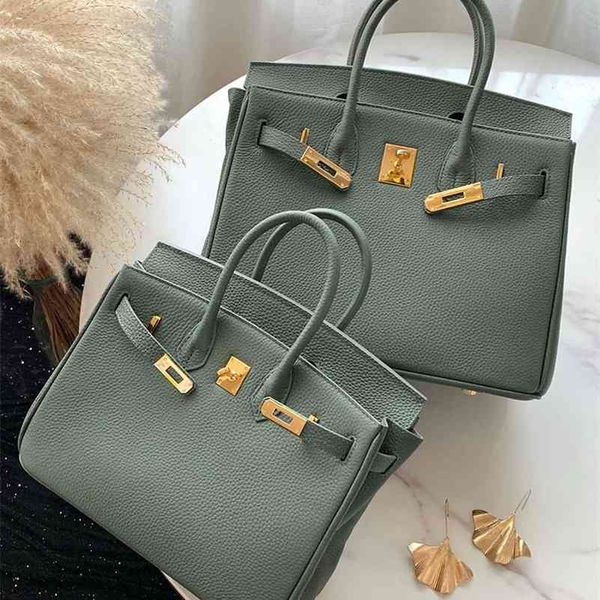 outlet herme lychee pattern leather kellys bag one shoulder high-grade feeling bag messenger foreign style portable lea wan
outlet herme lychee pattern leather kellys bag one shoulder high-grade feeling bag messenger foreign style portable lea wan