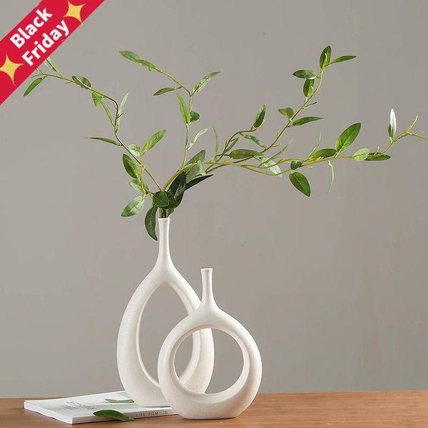 ceramic home crafts ornaments white vase small flower tv cabinet wine decorations vases
ceramic home crafts ornaments white vase small flower tv cabinet wine decorations vases