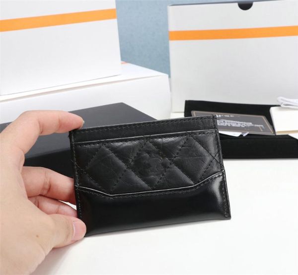 card holders western style chains shoulder bags genuine leather clutch wallet black clip short purse key case holder, Brown;gray
card holders western style chains shoulder bags genuine leather clutch wallet black clip short purse key case holder, Brown;gray