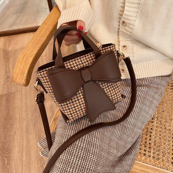 ins design shoulder version the female new bag niche korean backpack bow checkered handbag of meeuv
ins design shoulder version the female new bag niche korean backpack bow checkered handbag of meeuv