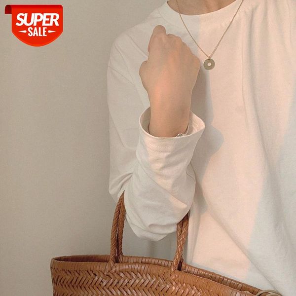 a simple beige round neck loose long-sleeved t-shirt for women in the base all-match #ib43, White
a simple beige round neck loose long-sleeved t-shirt for women in the base all-match #ib43, White