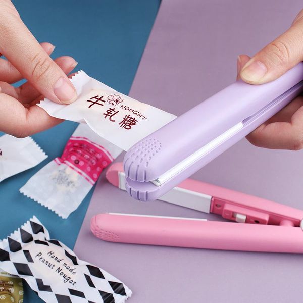 creative portable vacuum practical household preservation bag clips mini electric heat sealing machine seal package
creative portable vacuum practical household preservation bag clips mini electric heat sealing machine seal package