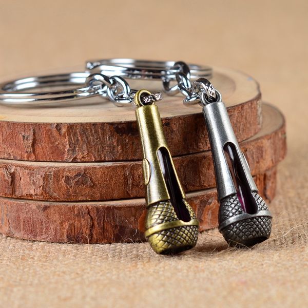10pieces/lot microphone keychain ktv microphone metal alloy creative gift key ring to send maiba male and female friends, Silver
10pieces/lot microphone keychain ktv microphone metal alloy creative gift key ring to send maiba male and female friends, Silver
