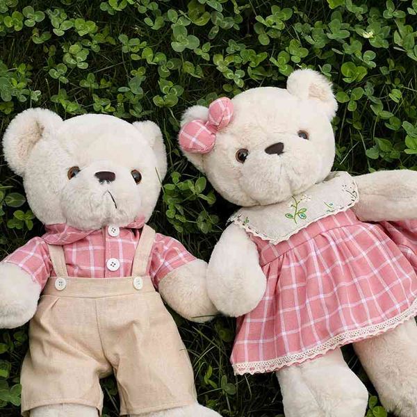a couple of bear plush dolls can be used as panda dolls, girls wear clothes, teddy bears
a couple of bear plush dolls can be used as panda dolls, girls wear clothes, teddy bears