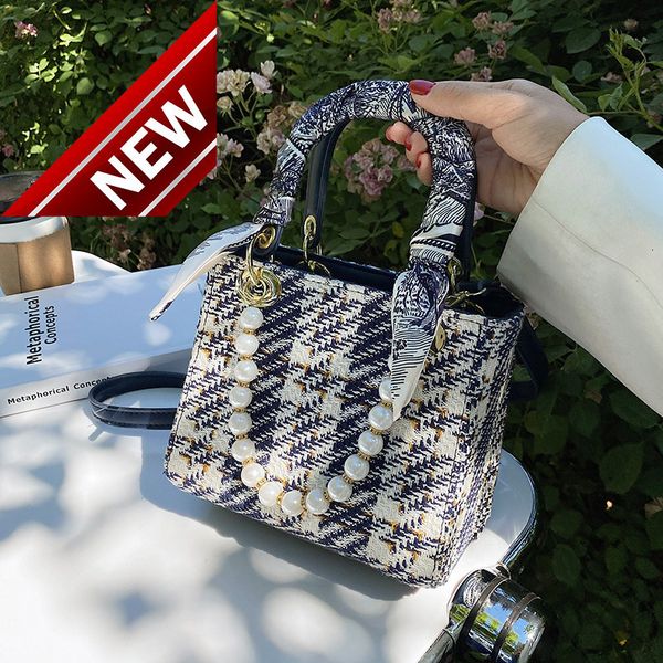 summer super fire small women's 2022 new fashion versatile messenger portable tweed princess bag
summer super fire small women's 2022 new fashion versatile messenger portable tweed princess bag