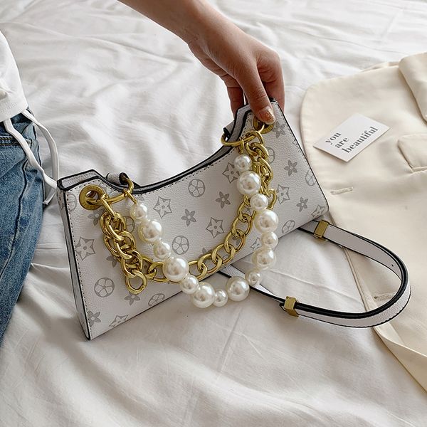 women trend 2021 women's ins star net red pearl hand-held underarm tidal current messenger bag
women trend 2021 women's ins star net red pearl hand-held underarm tidal current messenger bag