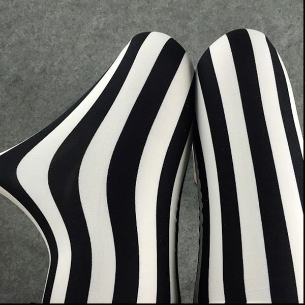 black and women legging white vertical striped printed leggings fashion casual elasticity mid calf pant female fitnes
black and women legging white vertical striped printed leggings fashion casual elasticity mid calf pant female fitnes