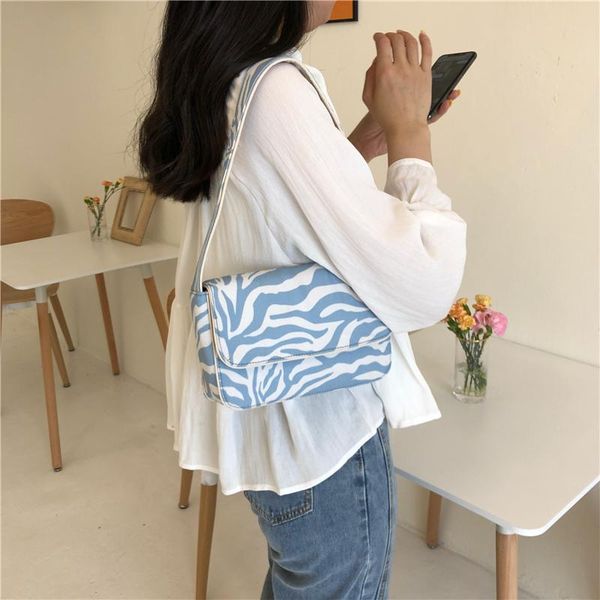 shoulder bags vintage design women canvas baguette handbags blue zebra pattern ladies fashion female small tote clutch purse
shoulder bags vintage design women canvas baguette handbags blue zebra pattern ladies fashion female small tote clutch purse