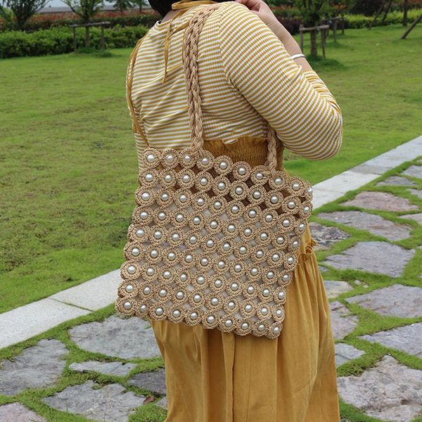 korean style pearl inlay straw bag women fashion woven open solid shoulder women's leisure vacation handbag woman 2021 evening bags
korean style pearl inlay straw bag women fashion woven open solid shoulder women's leisure vacation handbag woman 2021 evening bags