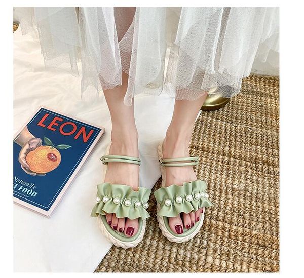 thick bottomed sandals women's summer slipper new one-line round head pearl fairy lotus leaf edge flat shoes, Black
thick bottomed sandals women's summer slipper new one-line round head pearl fairy lotus leaf edge flat shoes, Black