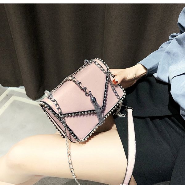 2021 british fashion simple small square bag women's designer handbag pu leather rivet tassel chain shoulder bags
2021 british fashion simple small square bag women's designer handbag pu leather rivet tassel chain shoulder bags