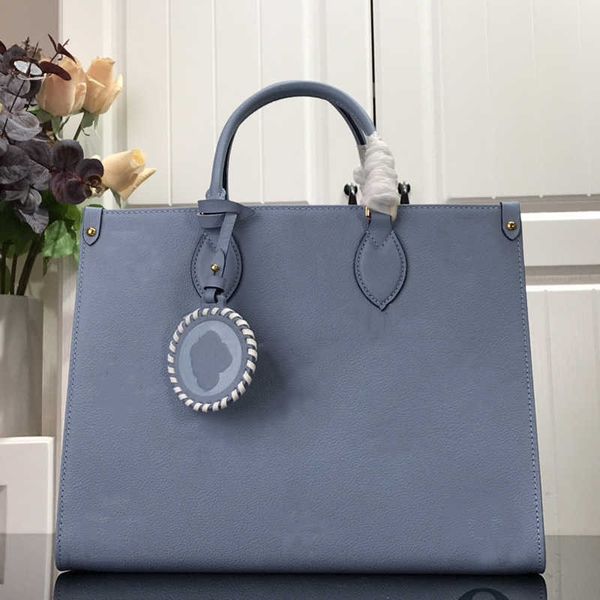 women luxurys designers handbag bags fashion and comfortable women's shoulder bag three in one package backpack wallet 35x27x14cm