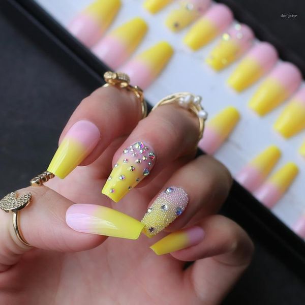 lemon yellow french ombre coffin shiny gel fake nails rhinestone glossy ballet false nail crystal art design caviar match1, Red;gold
lemon yellow french ombre coffin shiny gel fake nails rhinestone glossy ballet false nail crystal art design caviar match1, Red;gold
