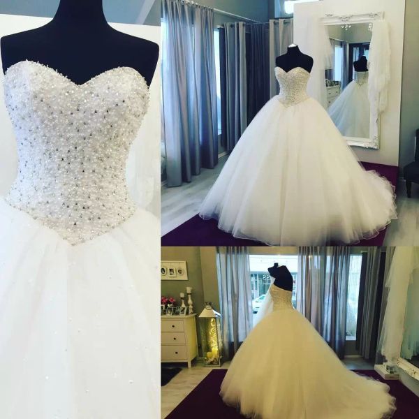 2022 beaded wedding dresses bridal gown sweep train tulle sweetheart neckline custom made plus size castle corset back garden vestido de nov, White
2022 beaded wedding dresses bridal gown sweep train tulle sweetheart neckline custom made plus size castle corset back garden vestido de nov, White