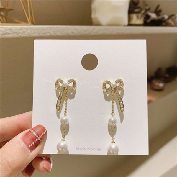 south korea dongdamen 2021 new pearl tassel bow 925 silver needle earrings for women, Black
south korea dongdamen 2021 new pearl tassel bow 925 silver needle earrings for women, Black