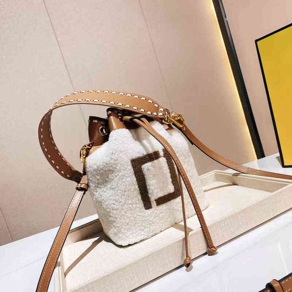 new women brand handbag lambhair bag fashion tassel design mini leather messenger single shoulder bucket cute luxury plush tote
new women brand handbag lambhair bag fashion tassel design mini leather messenger single shoulder bucket cute luxury plush tote