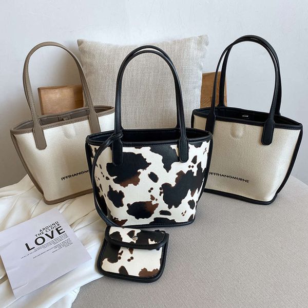 handbag women 2021 fashion trend large capacity tote bag milk pattern three piece set one shoulder armpit bag
handbag women 2021 fashion trend large capacity tote bag milk pattern three piece set one shoulder armpit bag