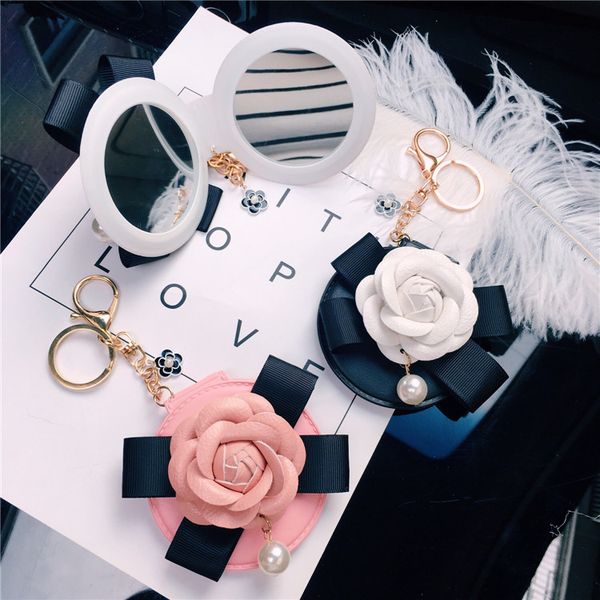 fashion bowknot camellia keychain carry on makeup small mirror bag pendant female car, Silver
fashion bowknot camellia keychain carry on makeup small mirror bag pendant female car, Silver