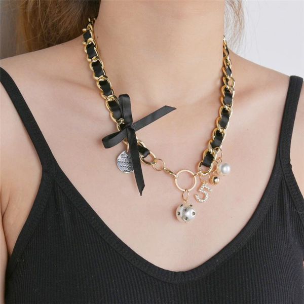 pendant necklaces woven pearl necklace female black leather bow number 5 temperament cool sweater chain, Silver
pendant necklaces woven pearl necklace female black leather bow number 5 temperament cool sweater chain, Silver