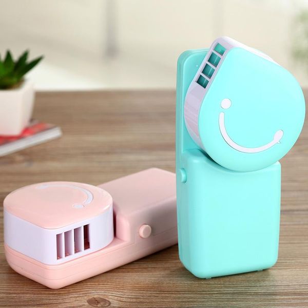 electric fans mini handheld fan air conditioner summer cooling cute face smiling ventilator device
electric fans mini handheld fan air conditioner summer cooling cute face smiling ventilator device