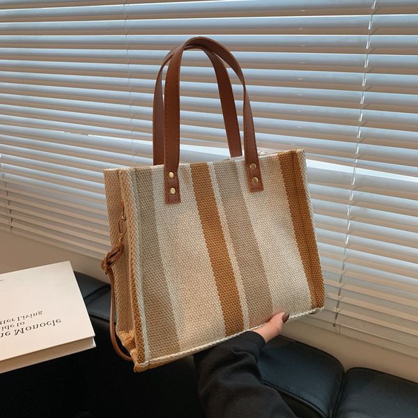 large capacity women's bag korean ins casual versatile stripe tote handbag fashion one shoulder messenger backpack
large capacity women's bag korean ins casual versatile stripe tote handbag fashion one shoulder messenger backpack