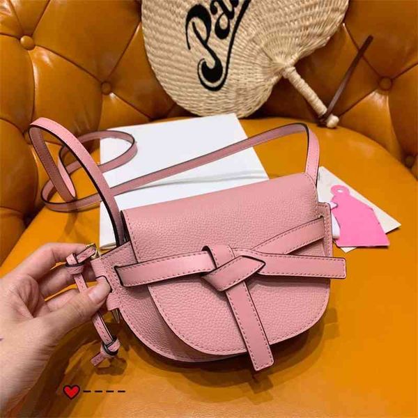 women luxurys designers bags 2021 butterfly knot buckle mini saddle leather messenger designer handbag handbags totes crossbody bag
women luxurys designers bags 2021 butterfly knot buckle mini saddle leather messenger designer handbag handbags totes crossbody bag