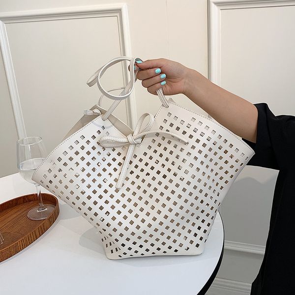 evening bag female 2021 summer korea hollow out large capacity tote mother portable one shoulder messenger
evening bag female 2021 summer korea hollow out large capacity tote mother portable one shoulder messenger
