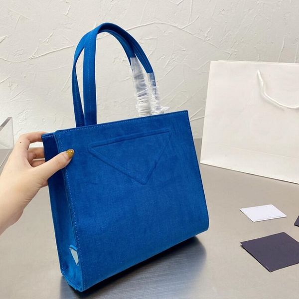 large capacity totes canvas shoulder shopping bags wide temperament fashion leisure handbags classic letter triangular high quality
large capacity totes canvas shoulder shopping bags wide temperament fashion leisure handbags classic letter triangular high quality
