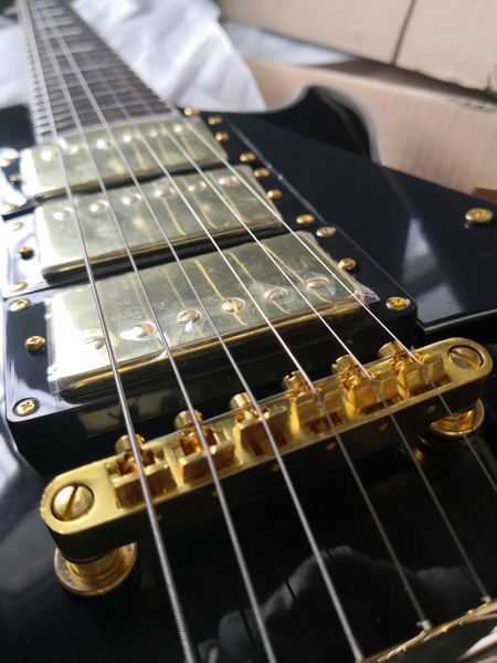 delivery custom les 6 strings guitar,black guitar,mahogany ,hhh pickups,gold button, shell inlay,black switch
delivery custom les 6 strings guitar,black guitar,mahogany ,hhh pickups,gold button, shell inlay,black switch